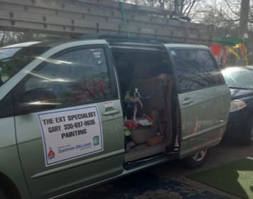 Exterior Specialist work van and the company dog